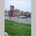 boat_at_waterway_signs.jpg